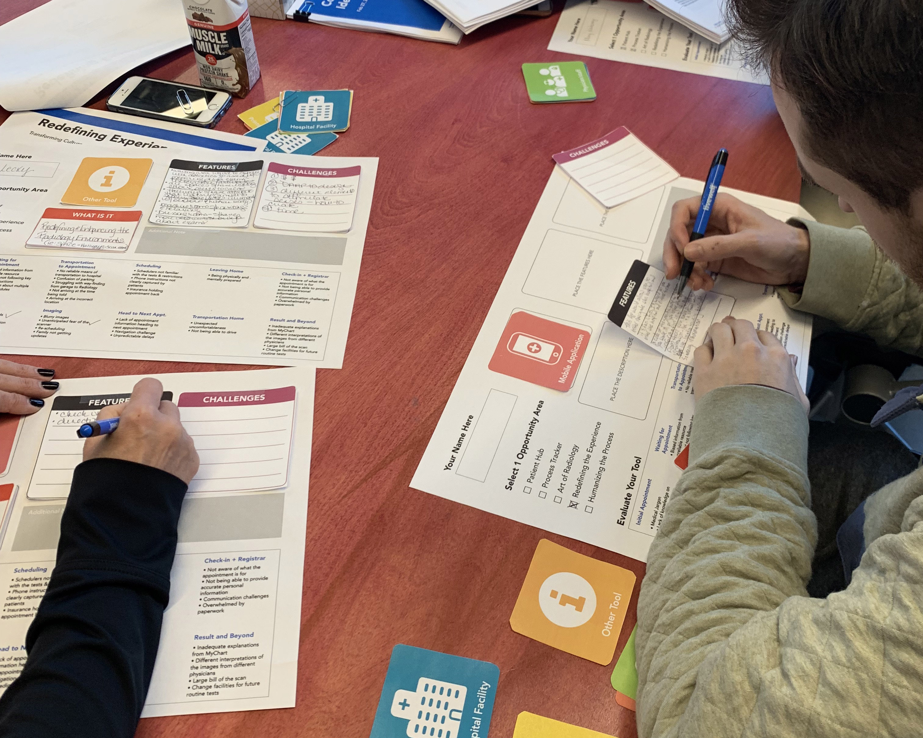 A project participant completing an activity to ideate solutions based off different challenges.