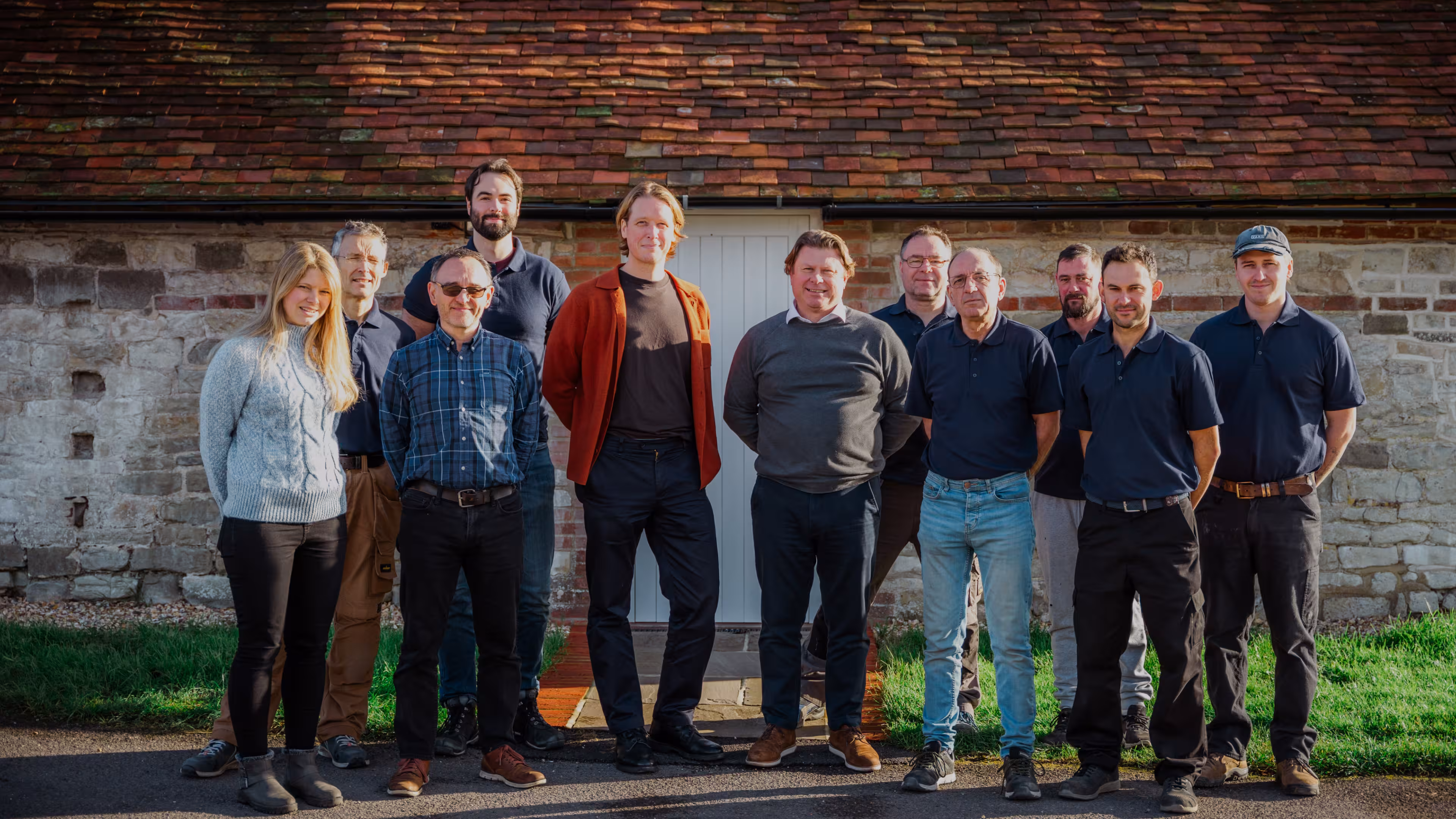 The Ashon Bespoke Team stood togther in a line outside their office