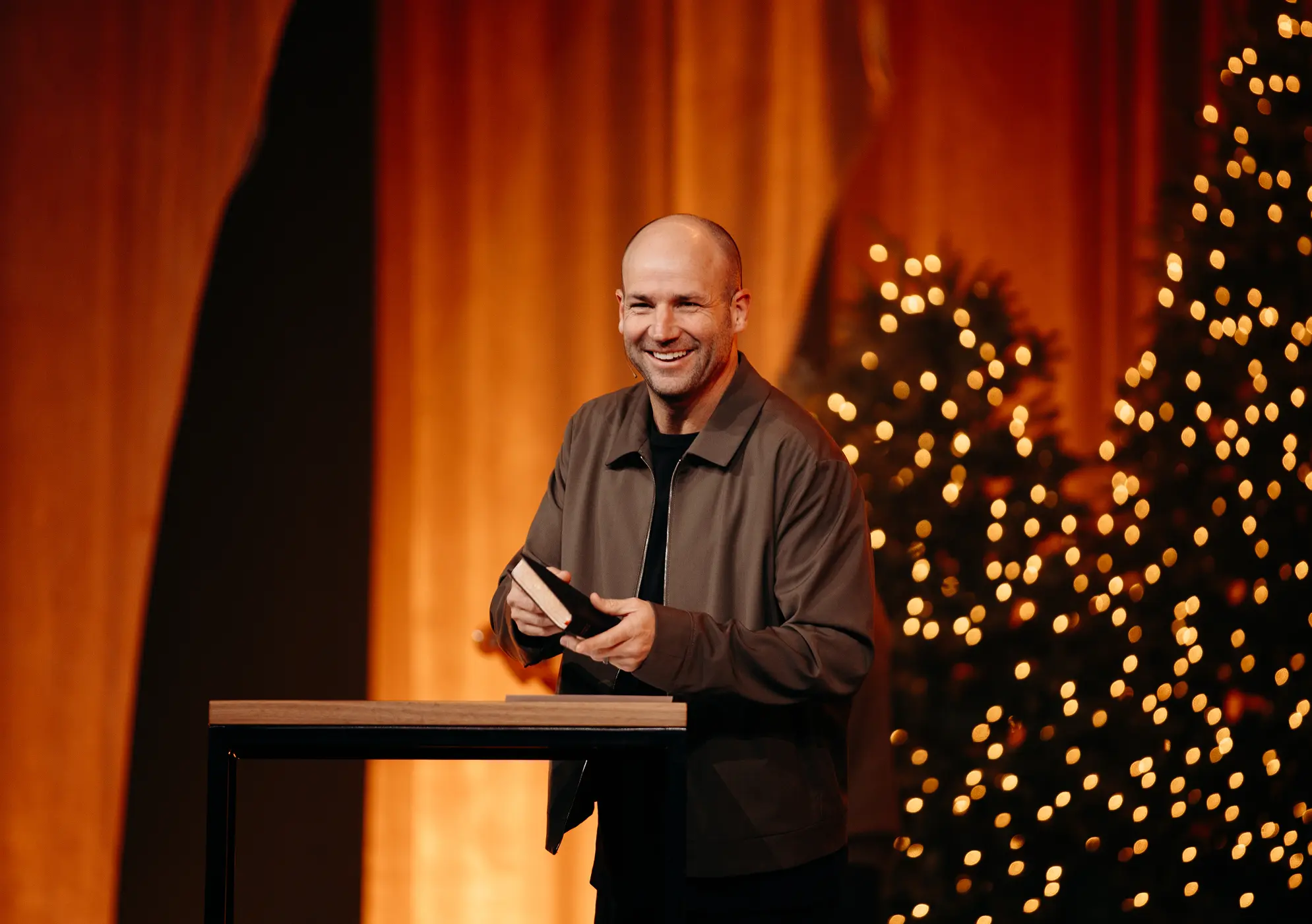 Pastor Brad Jones on stage at Christmas