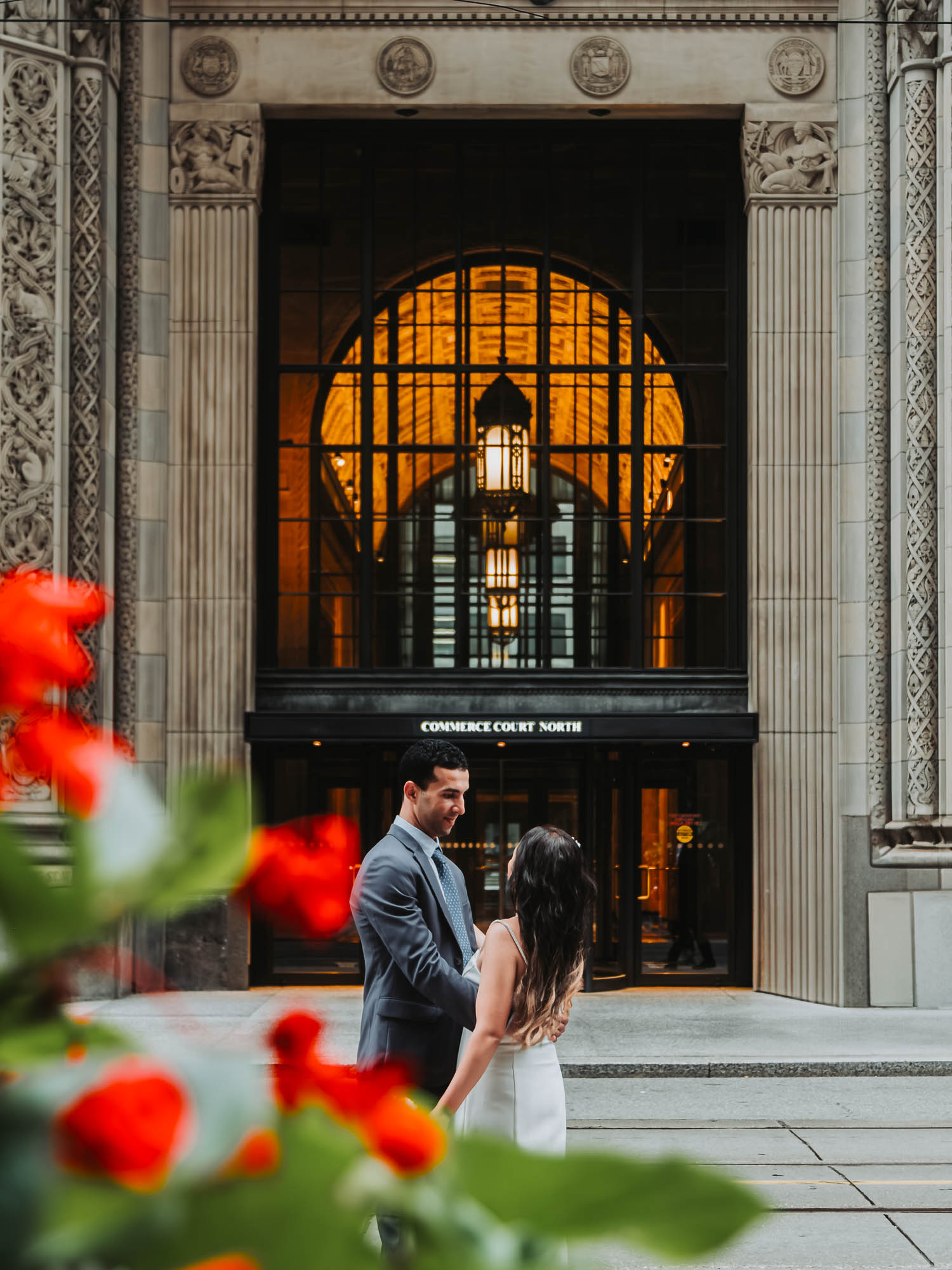 A couple street photoshoot in Downtown Toronto on King st W, with a historical background - Kash Klicks Studios