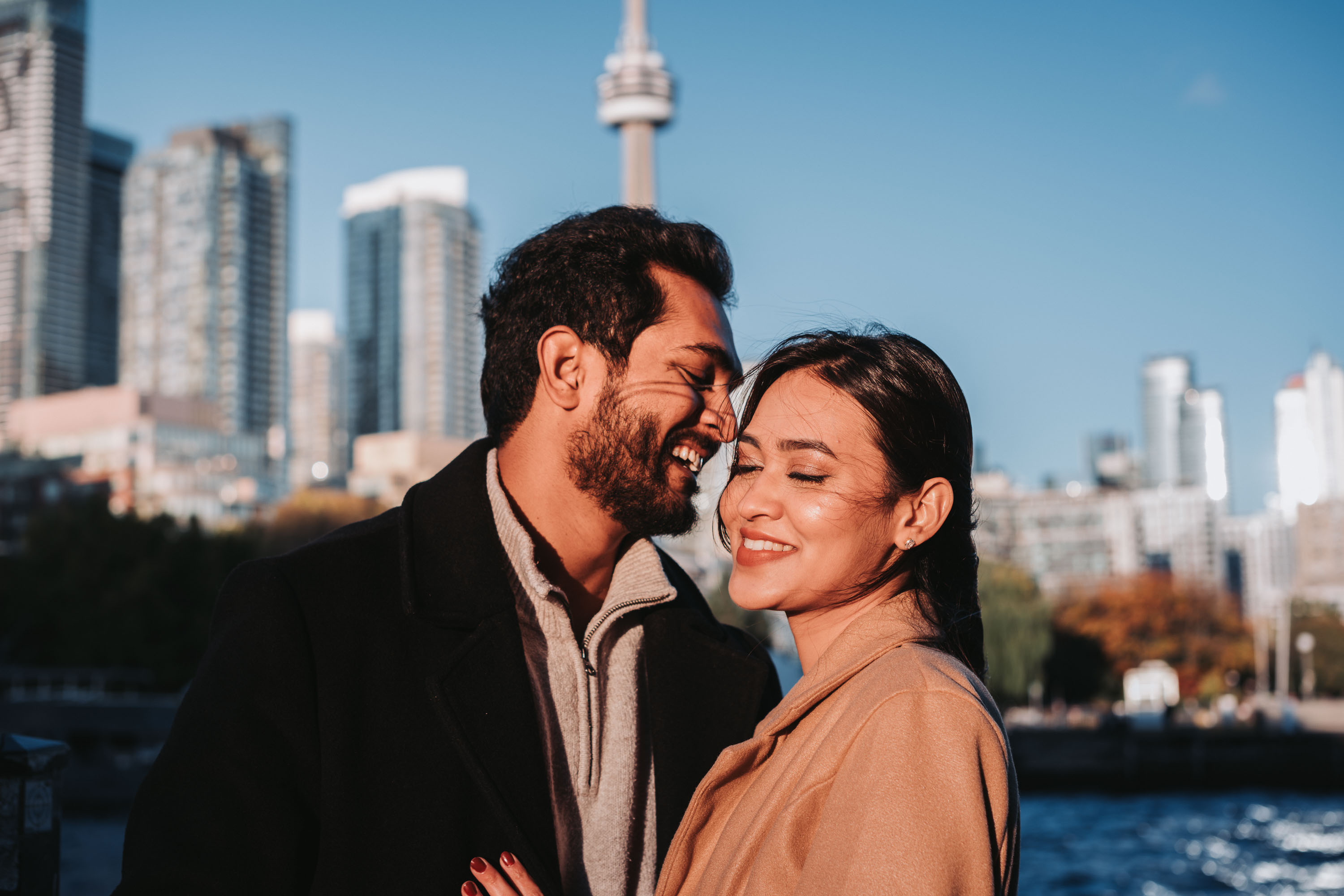 Engaged couple on a yacht in Toronto during a pre-wedding photoshoot