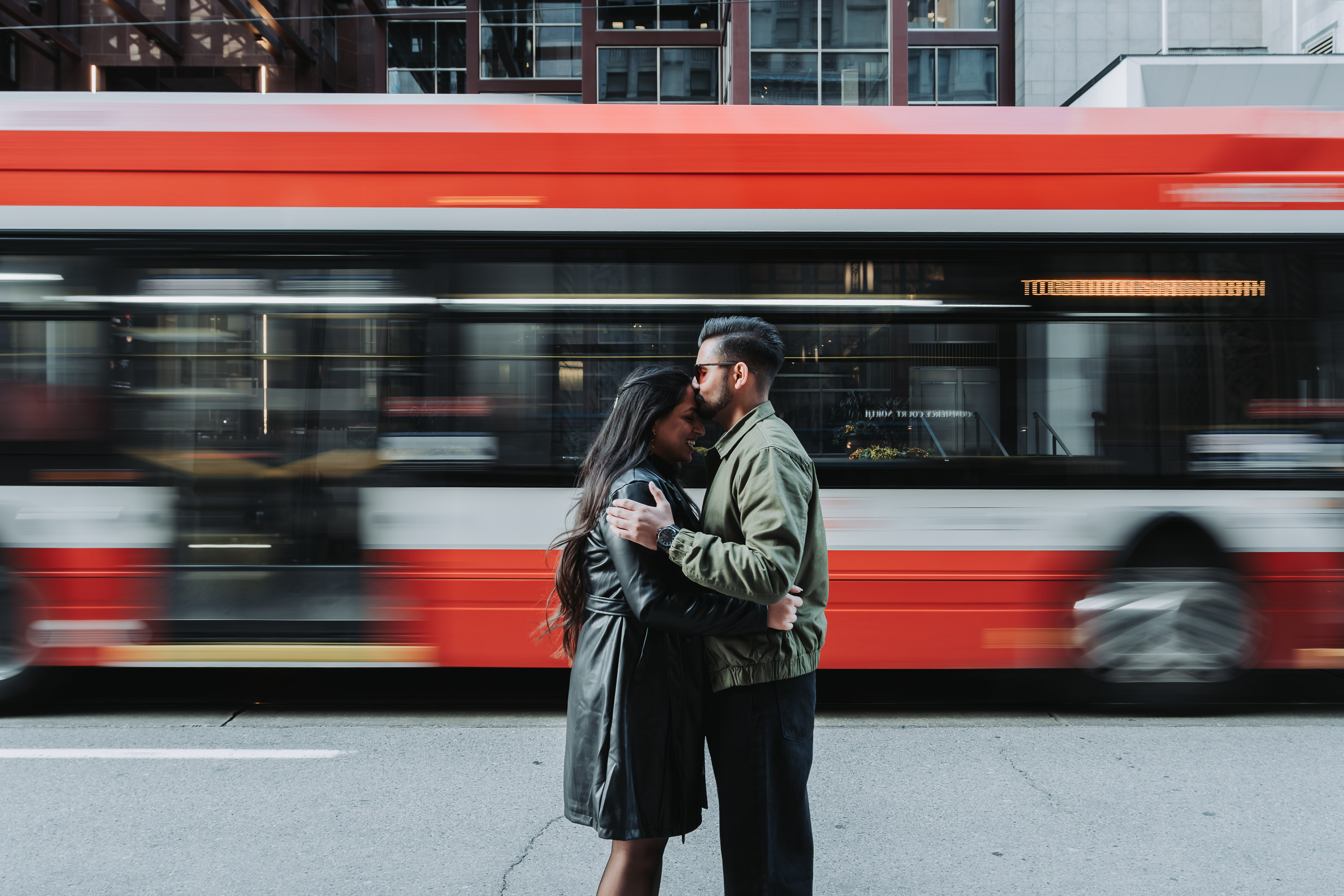 Engaged couple on a yacht in Toronto during a pre-wedding photoshoot