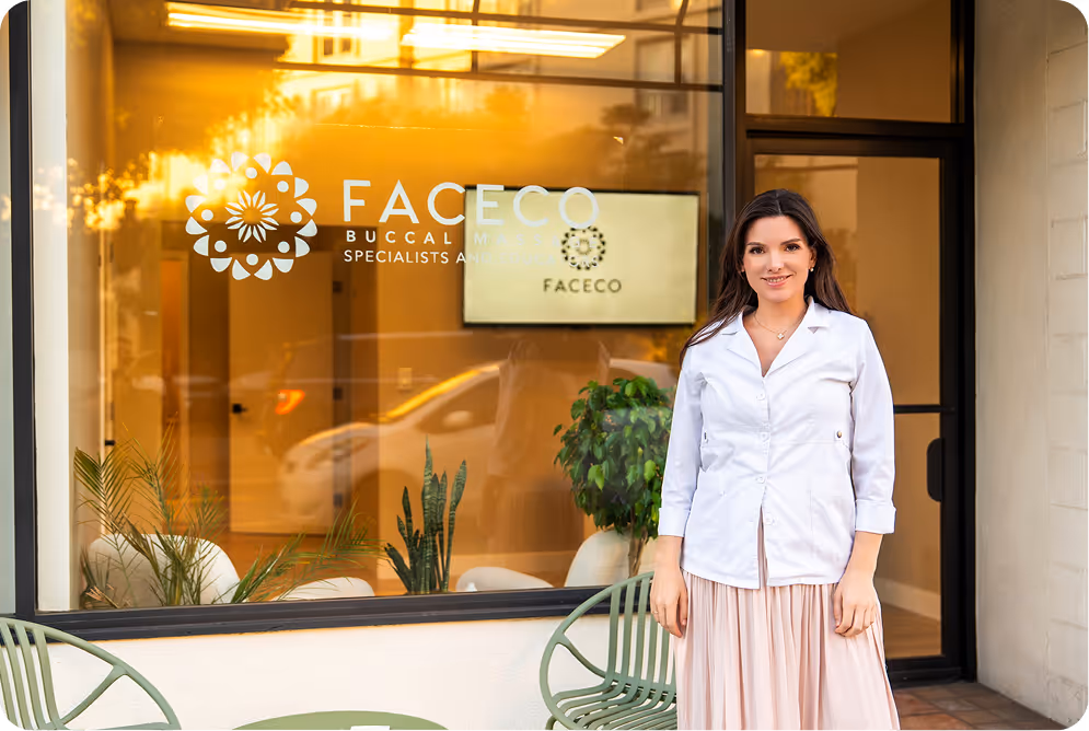 Faceco founder Polina standing in front of salon entrance