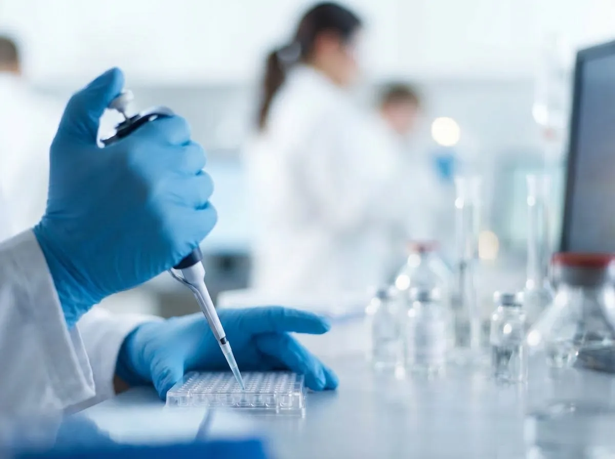 Lab technician analyzing samples during a drug screening test