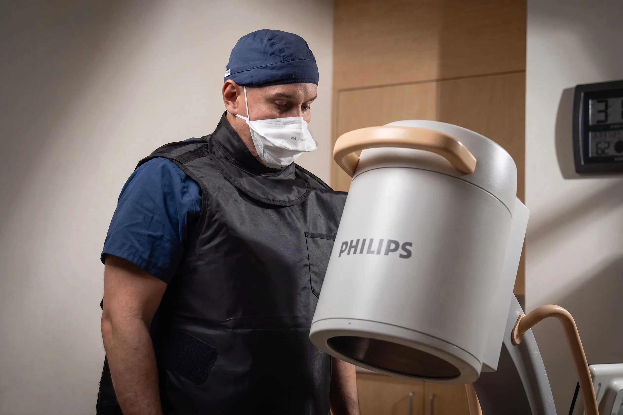WorkStar healthcare provider wearing protective gear while preparing patient care supplies