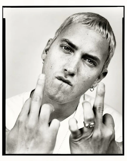 A young Eminem giving the middle finger