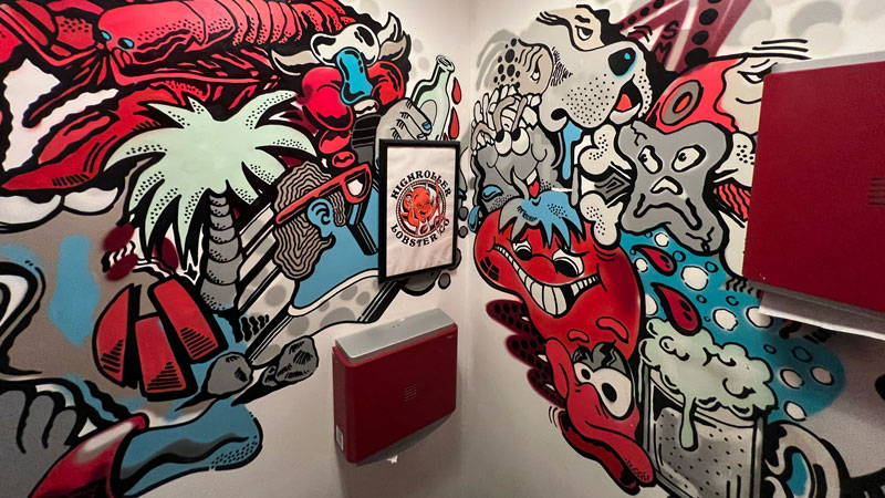 Highroller Lobster Co. bathroom art