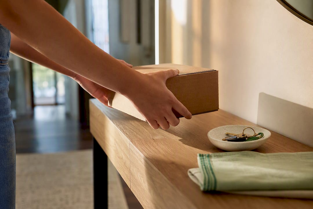 Hands receiving a discreet prescription delivery