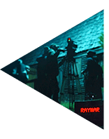 Behind the scenes of a shadow magic productions film set with cameras and thematic lighting