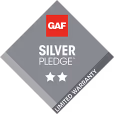 GAF Silver Pledge badge with two stars and limited warranty text on a gray diamond background.