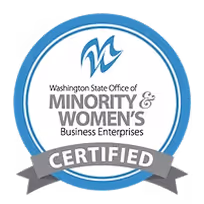 Washington State Office of Minority & Women's Business Enterprises certified badge with a blue circular border and gray ribbon.