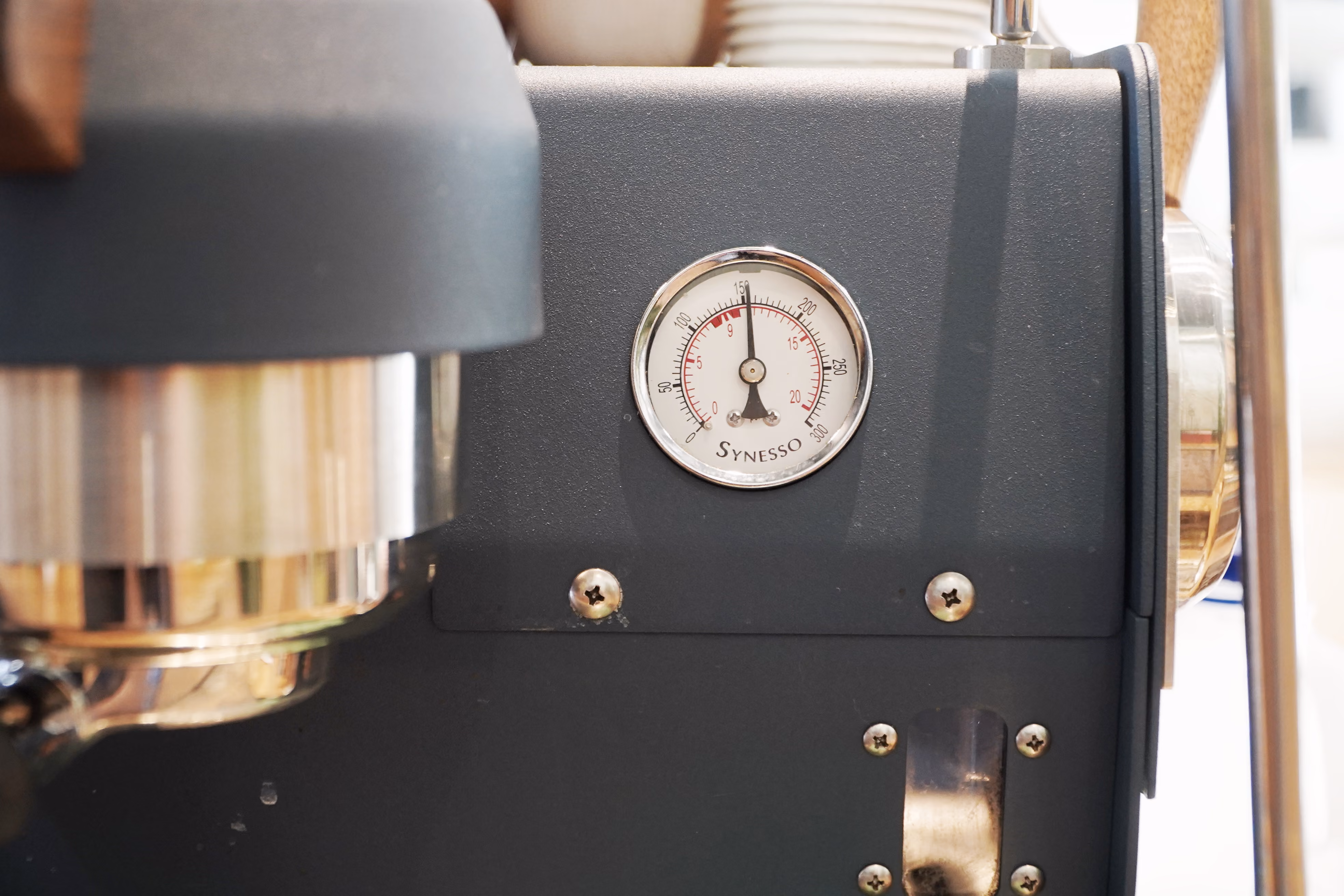 Close-up of the pressure gauge on a Synesso espresso machine