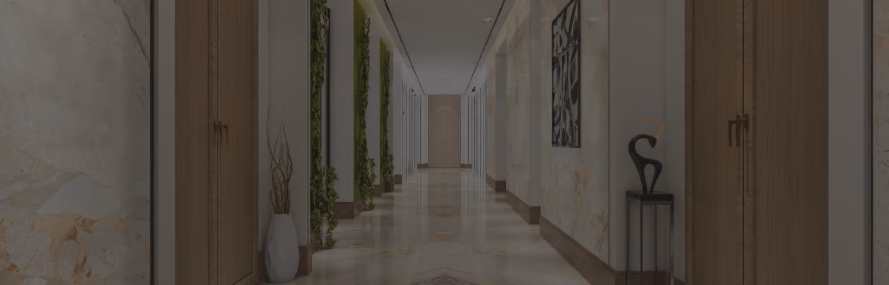 Long, modern hallway with marble flooring, wooden doors, green vertical plant decorations, and abstract wall art.