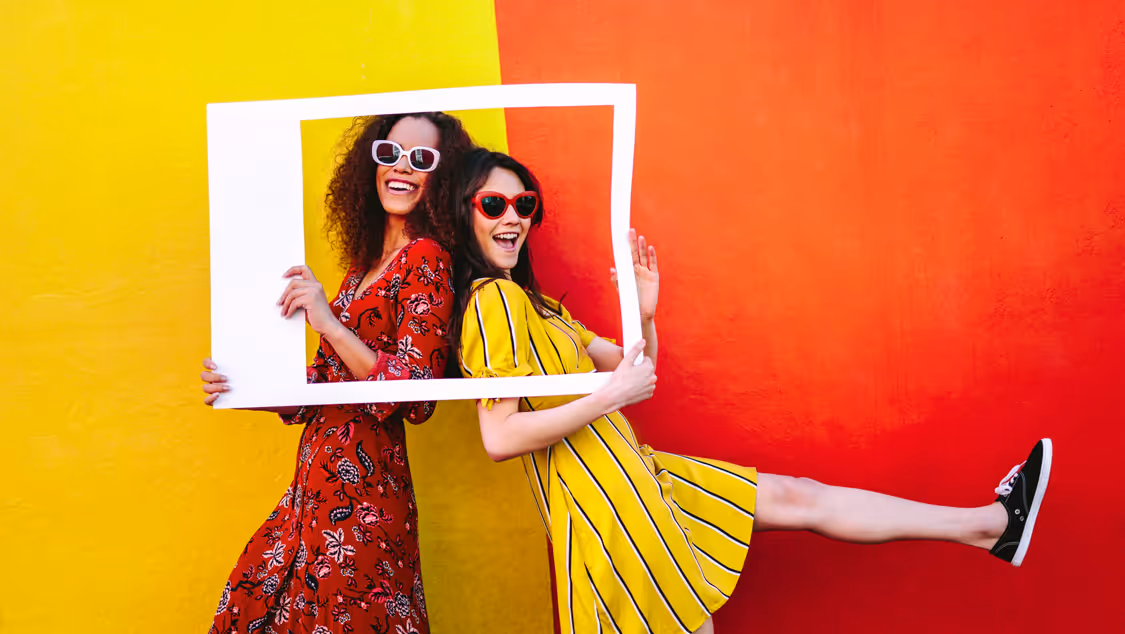 2 women posing for a picture for social media