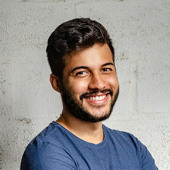 Man wearing blue crew neck t shirt