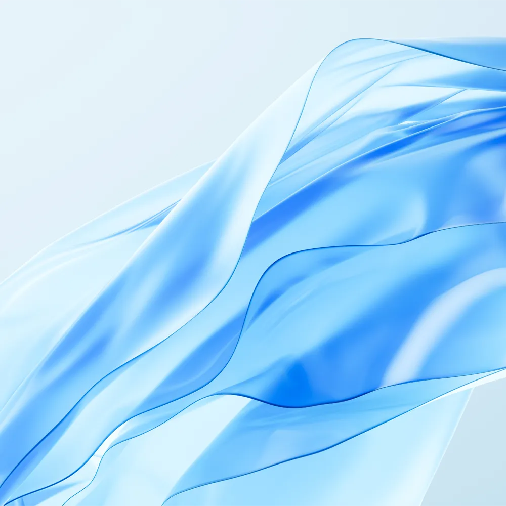 Translucent blue fabric flowing smoothly against a light background.