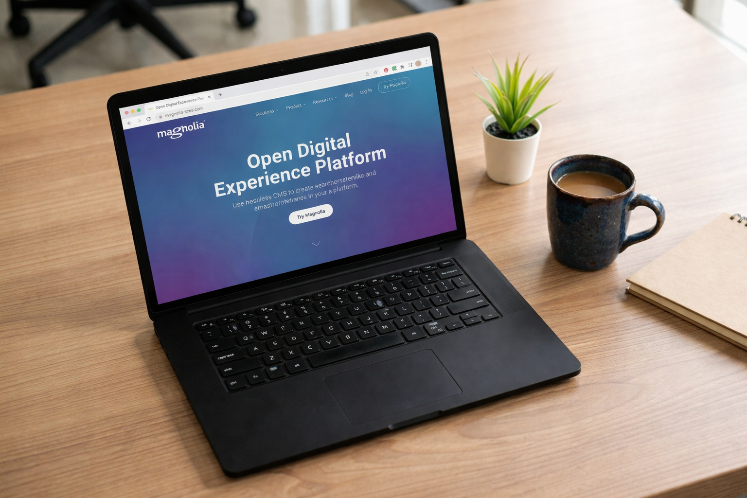 Magnolia CMS website showing on a laptop screen