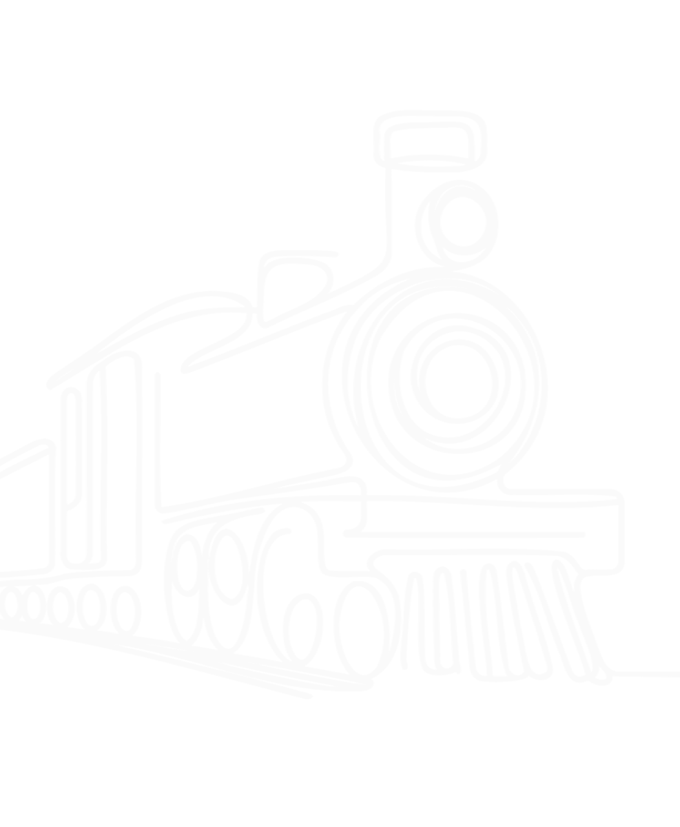 Black steam locomotive train on railway tracks with a dark moody sky background.