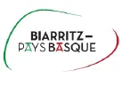 Logo with the text 'Biarritz Pays Basque' surrounded by two curved lines in green and red.