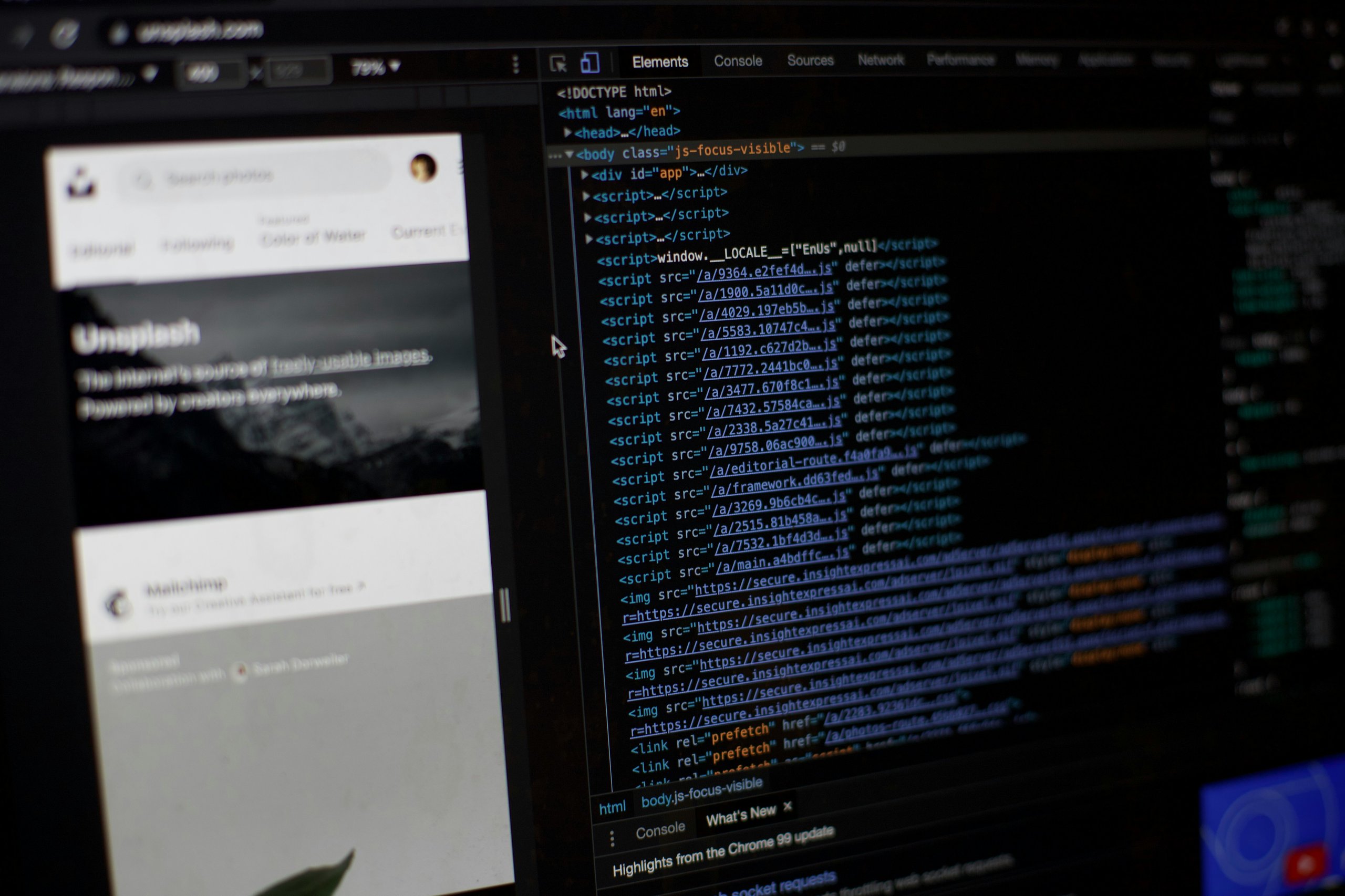 Computer screen displaying web development code in a browser's developer tools next to a blurred webpage interface.