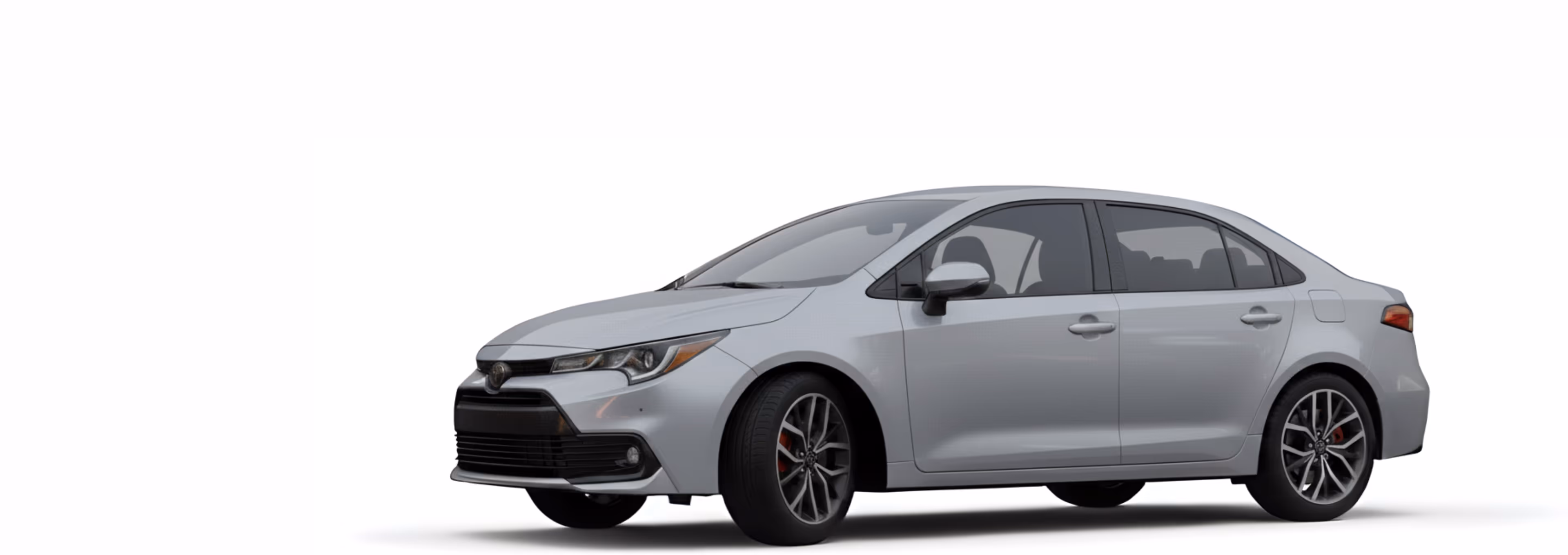 Silver Toyota Corolla sedan viewed from the front-left side on a white background.
