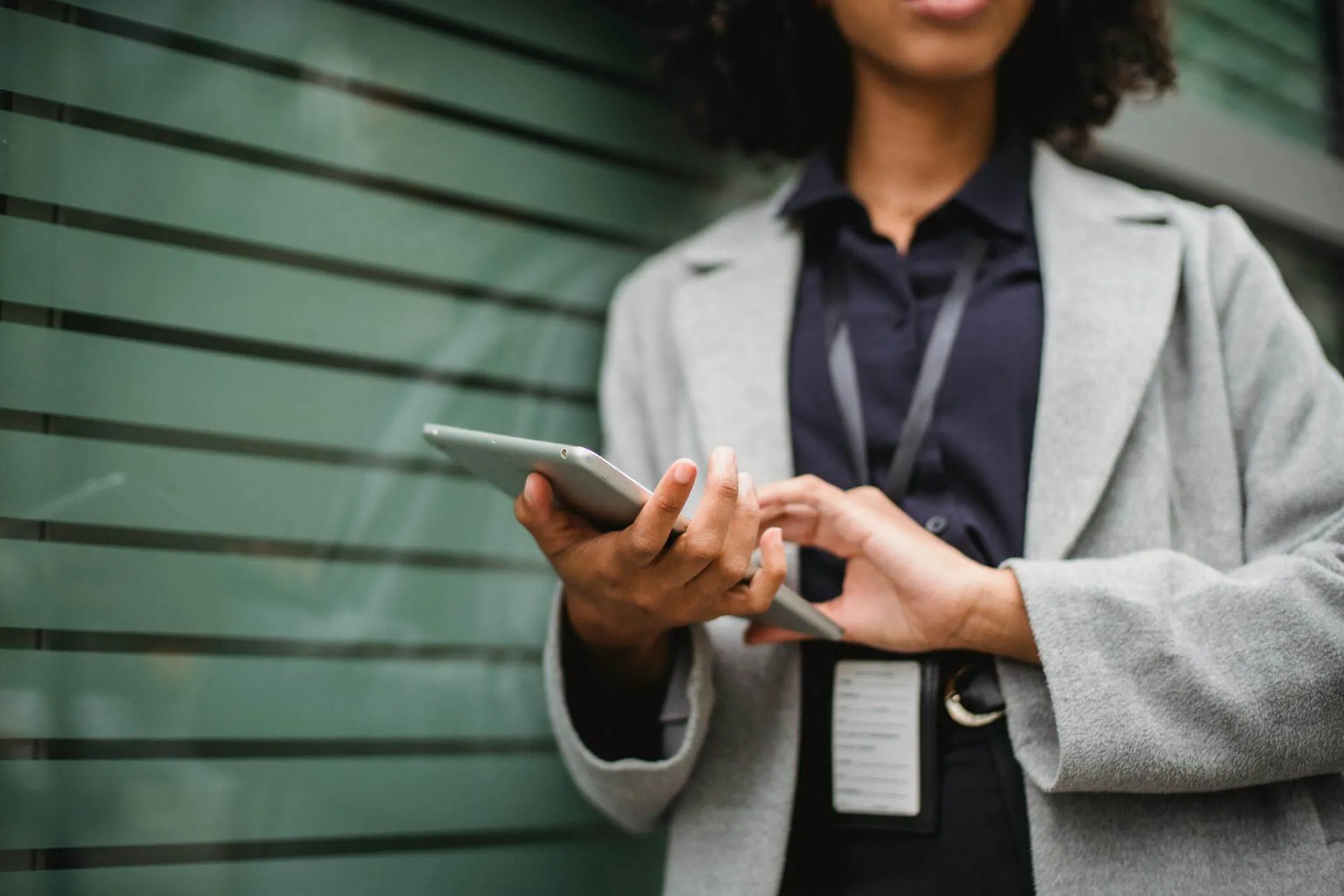 woman holding tablet