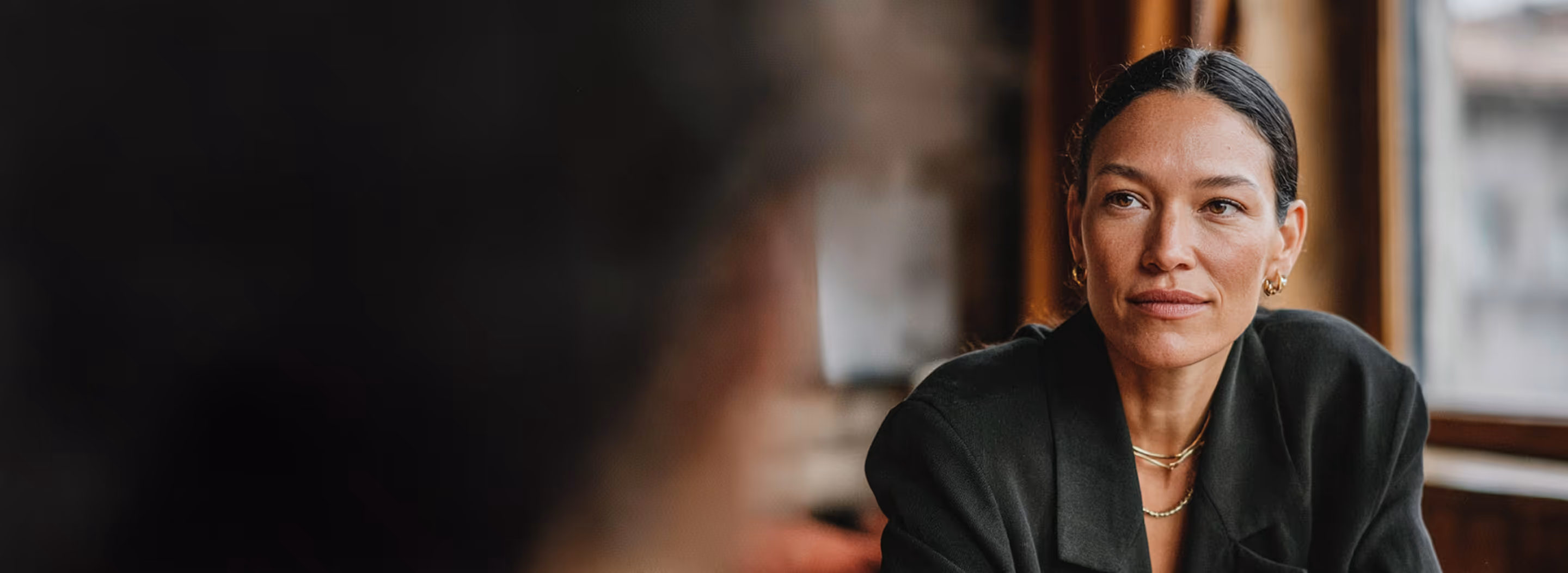 elegant woman sitting and smiling