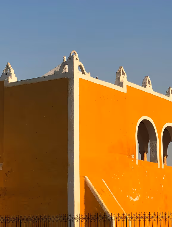 orange house and blue sky
