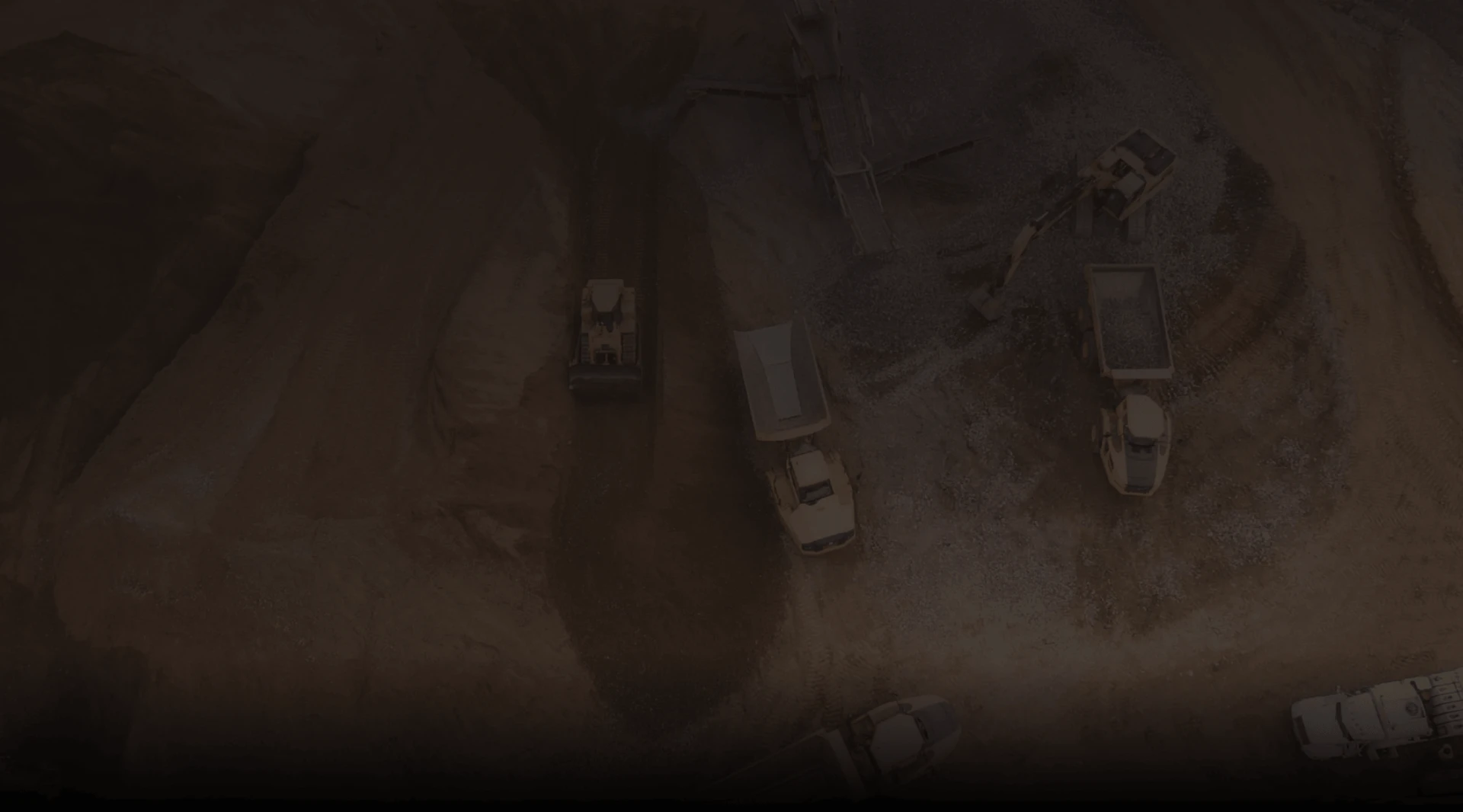 Open-pit mining site with heavy trucks