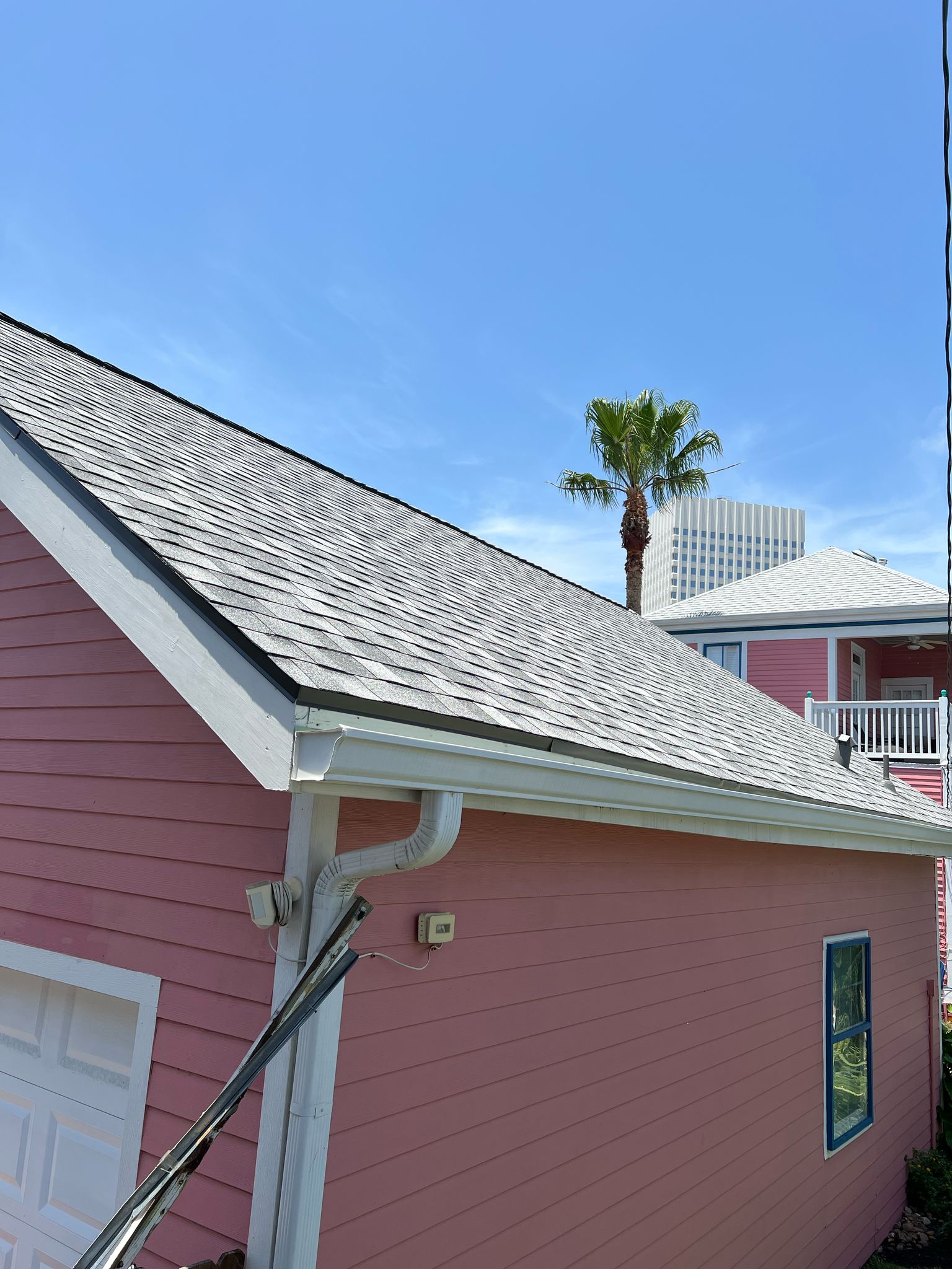 Hurricane rated roofing installation Houston TX showing 6-nail fastening pattern