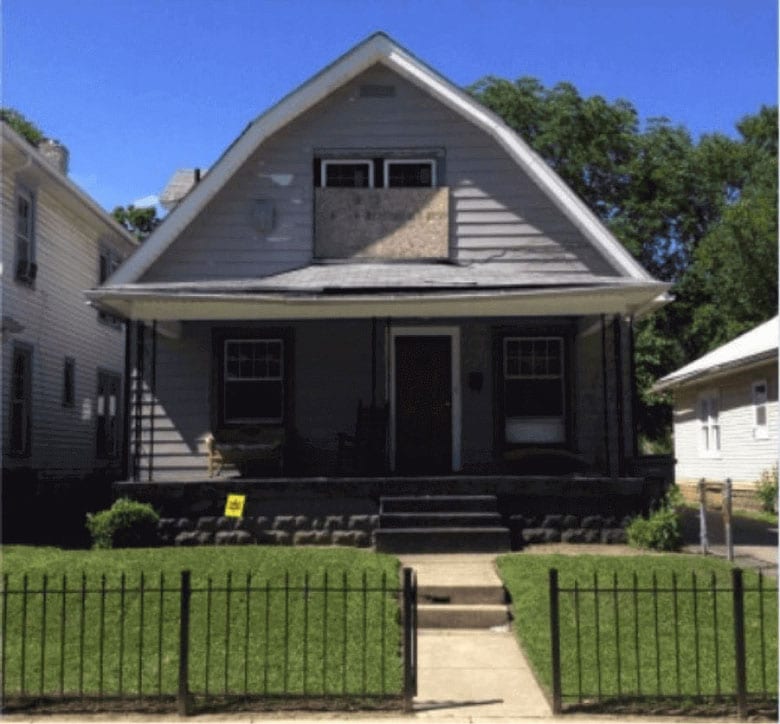 house with broken window