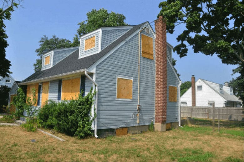 boarded up house
