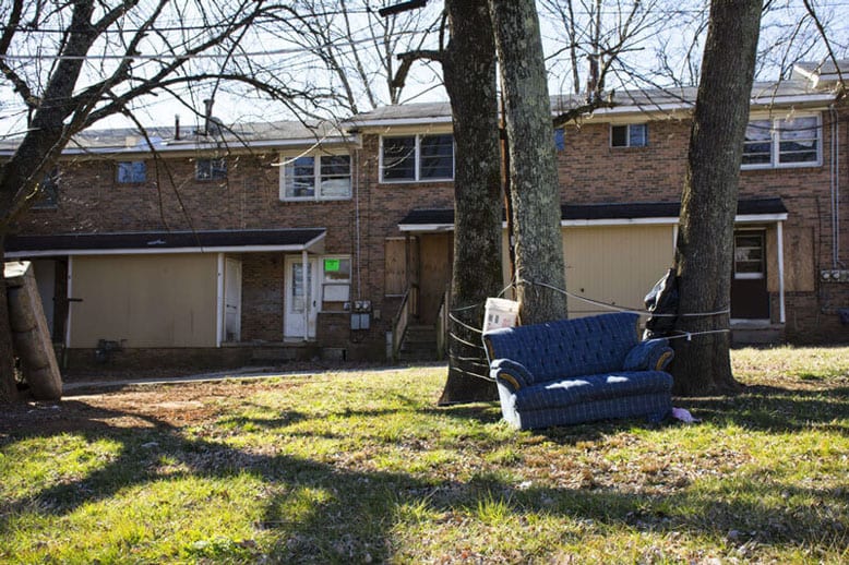home with trash outside