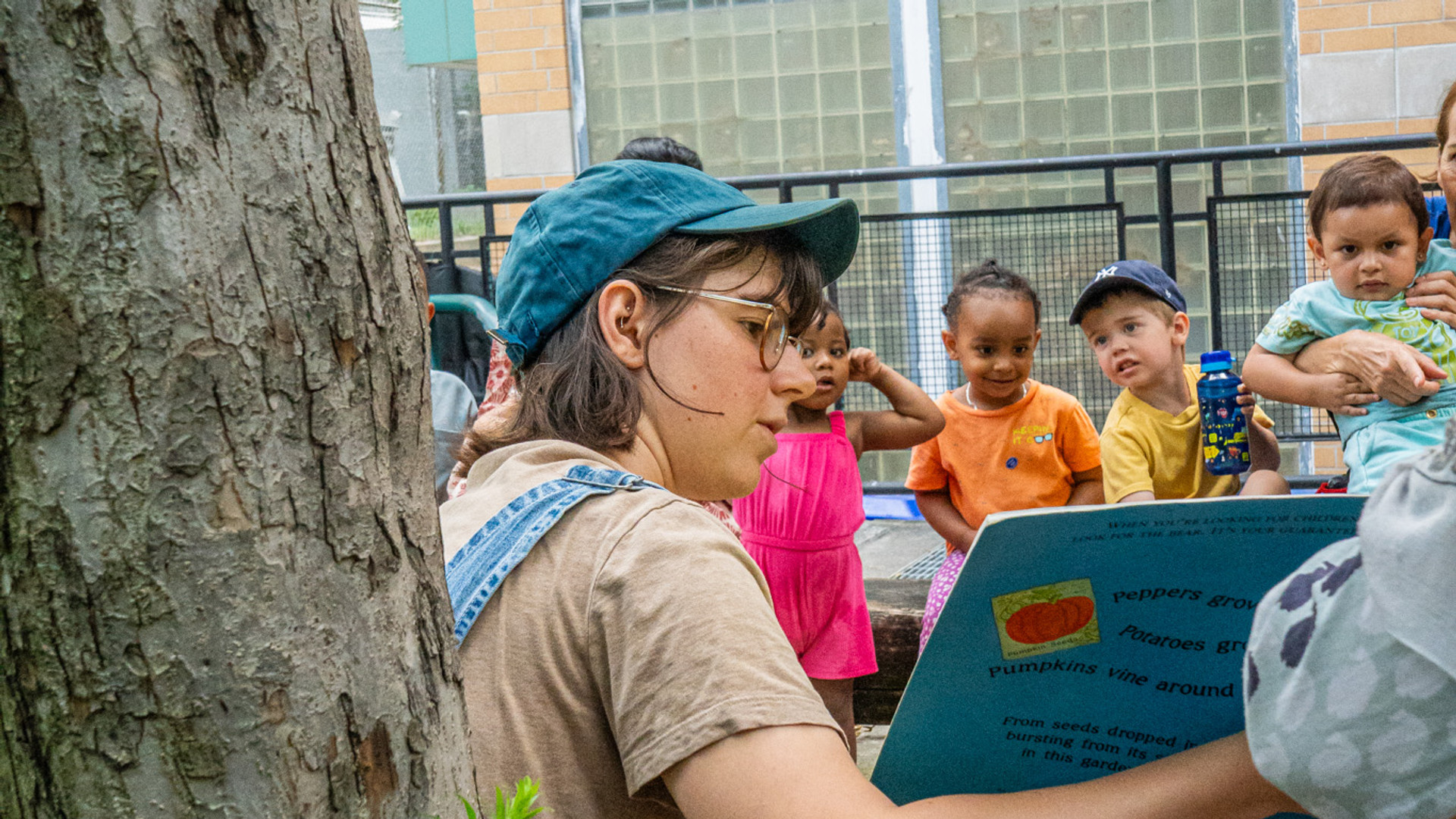 Sophie Mihevc reads a story to the littles