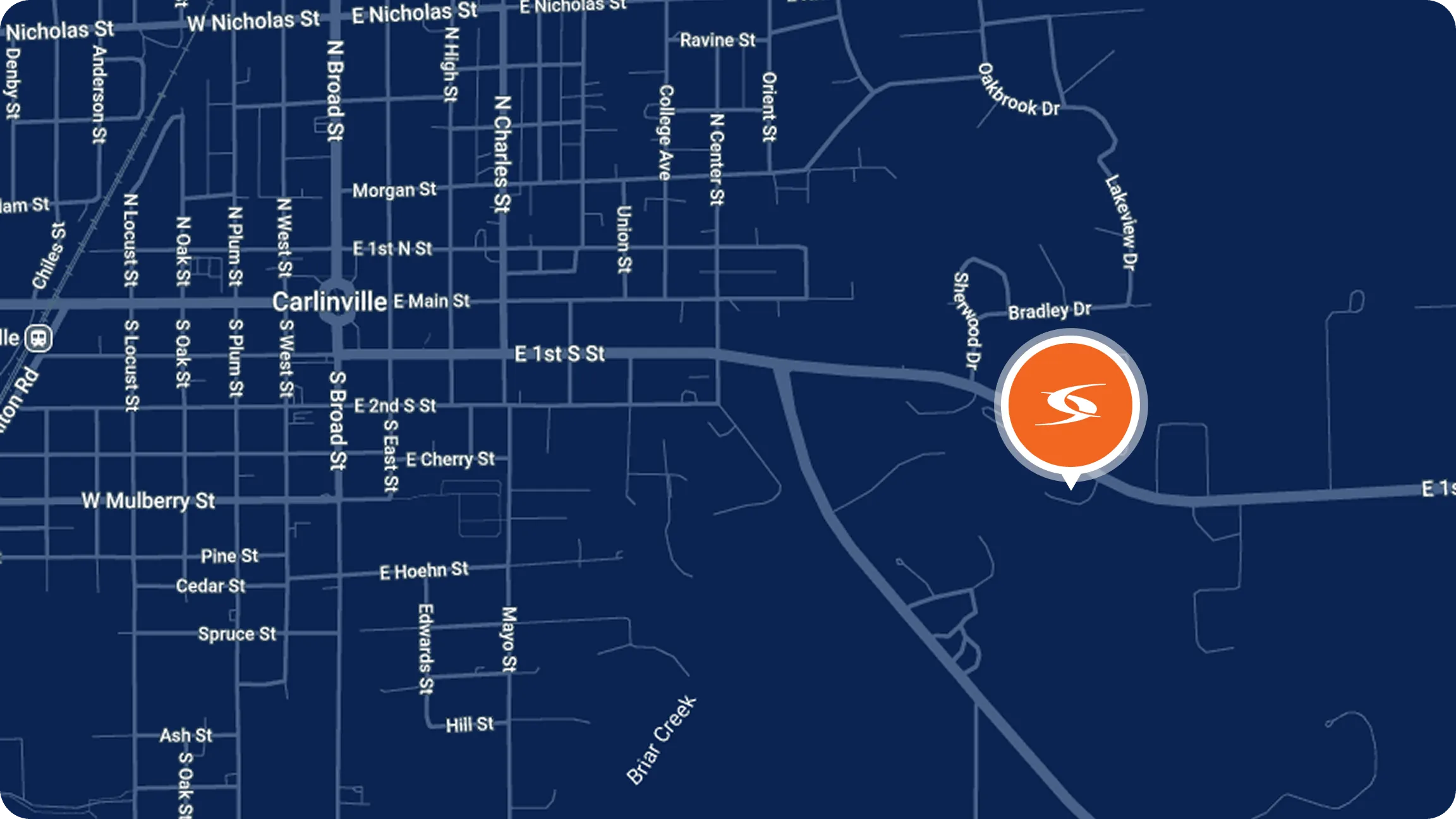 Map of Carlinville, Illinois, showing street names and a highlighted location marker on E 1st St near Bradley Dr and Sherwood Dr.