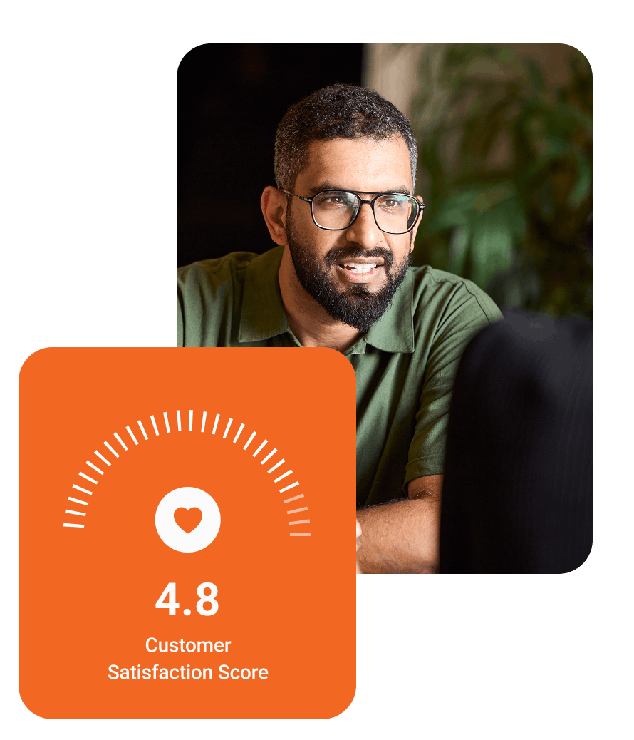 Smiling man with glasses in a green shirt next to an orange graphic showing a 4.8 customer satisfaction score with a heart icon.