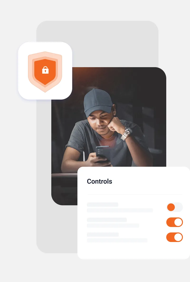 Young man wearing a cap looking at his smartphone, accompanied by a shield icon with a lock and a controls panel with toggle switches.