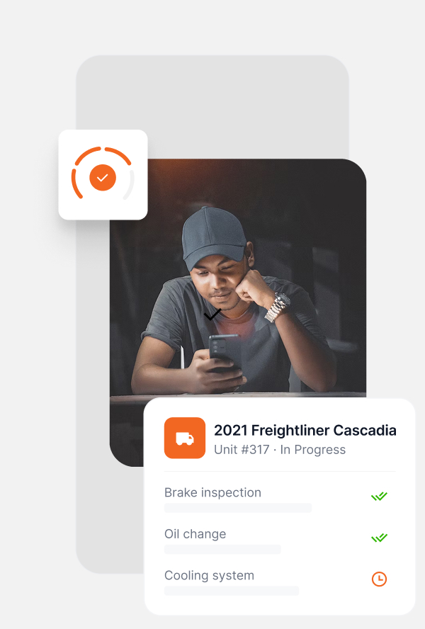 Man wearing a cap looking at his phone, with a digital maintenance checklist for a 2021 Freightliner Cascadia showing brake inspection and oil change completed, cooling system pending.