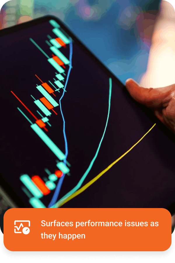 Hand holding a tablet displaying a candlestick stock chart with three lines plotting data trends in blue, cyan, and yellow.
