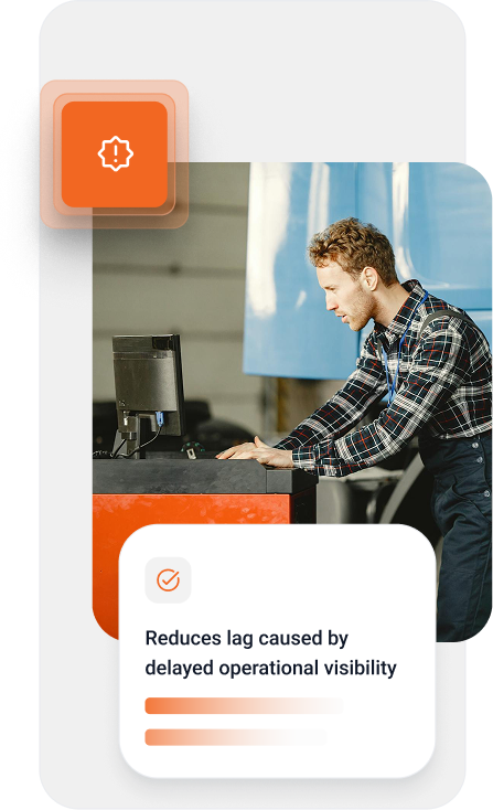 Man in checkered shirt and overalls working on a computer near a large vehicle, with a message about reducing lag.