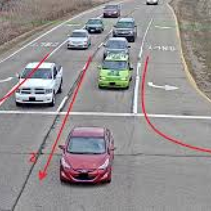 Two lanes of cars moving in the same direction.