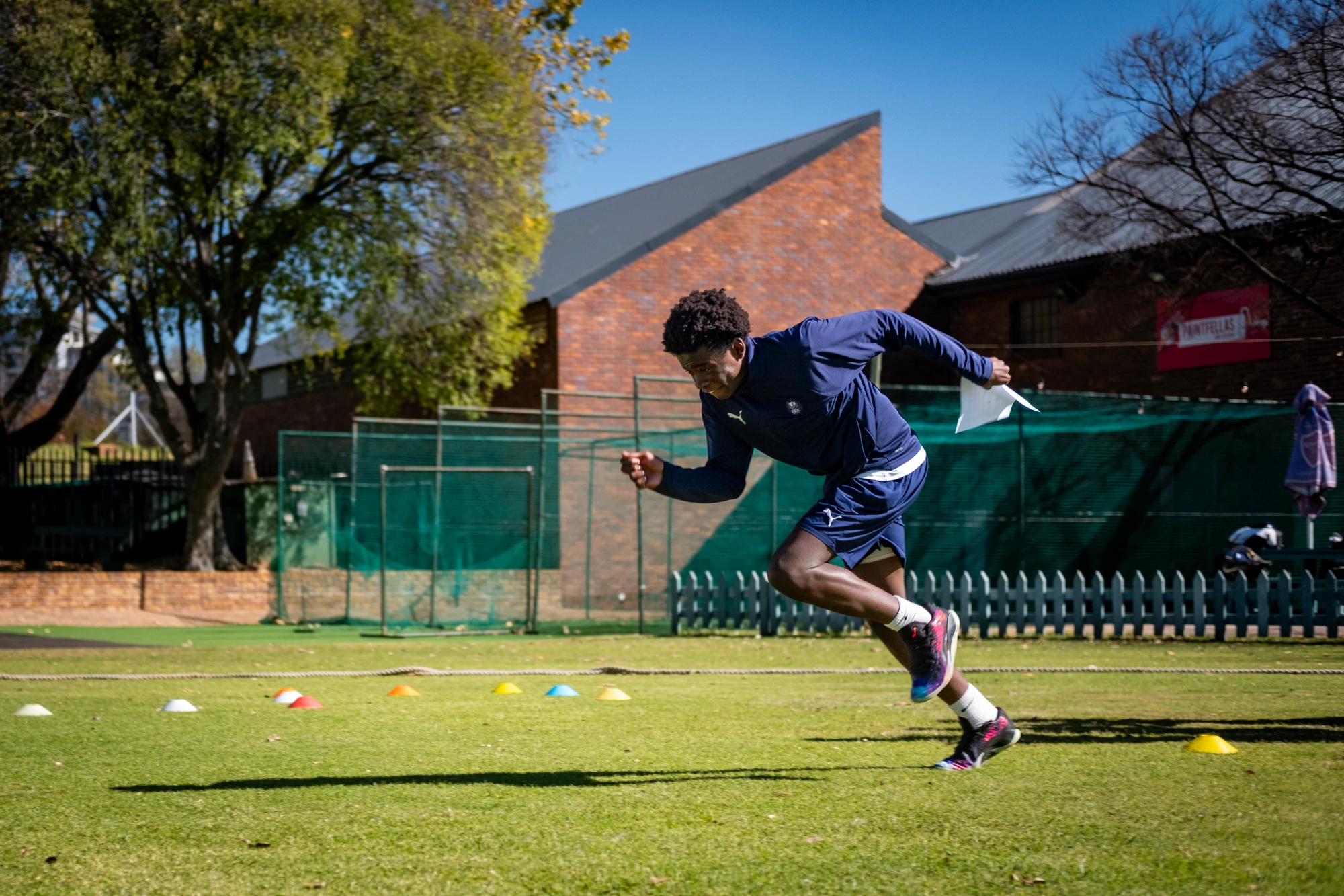 Esca Athlete Sprinting On Field