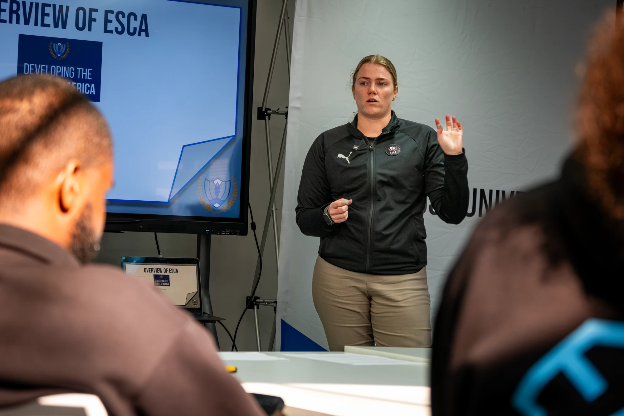 Esca Woman Giving Presentation