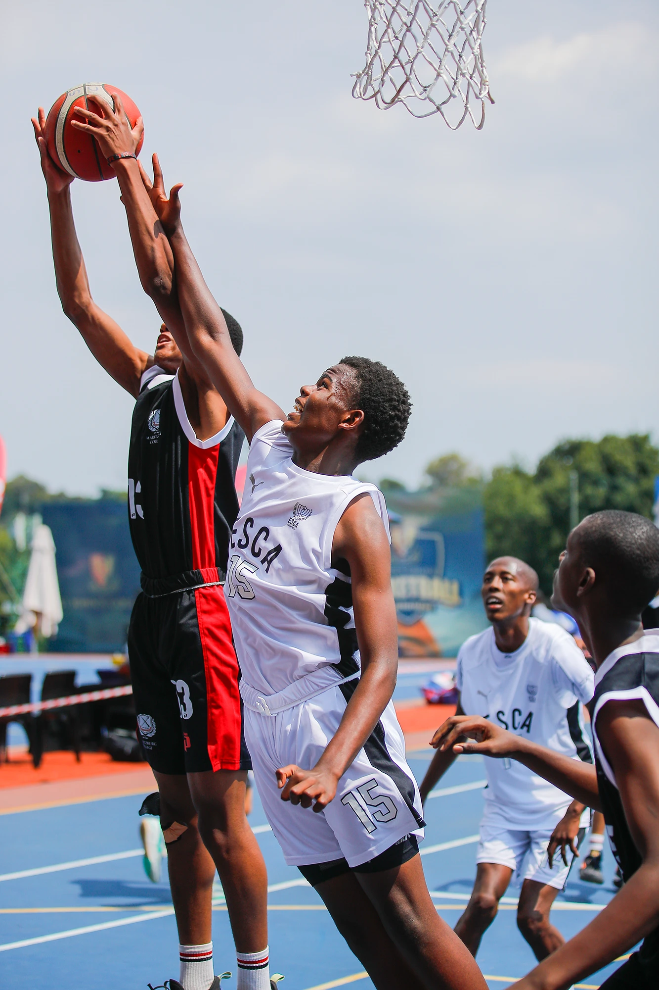 Esca Young Basketball Players Competing