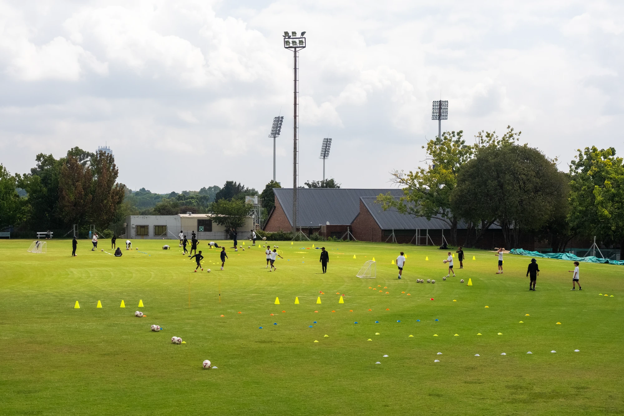Esca Children Practicing Soccer Drills