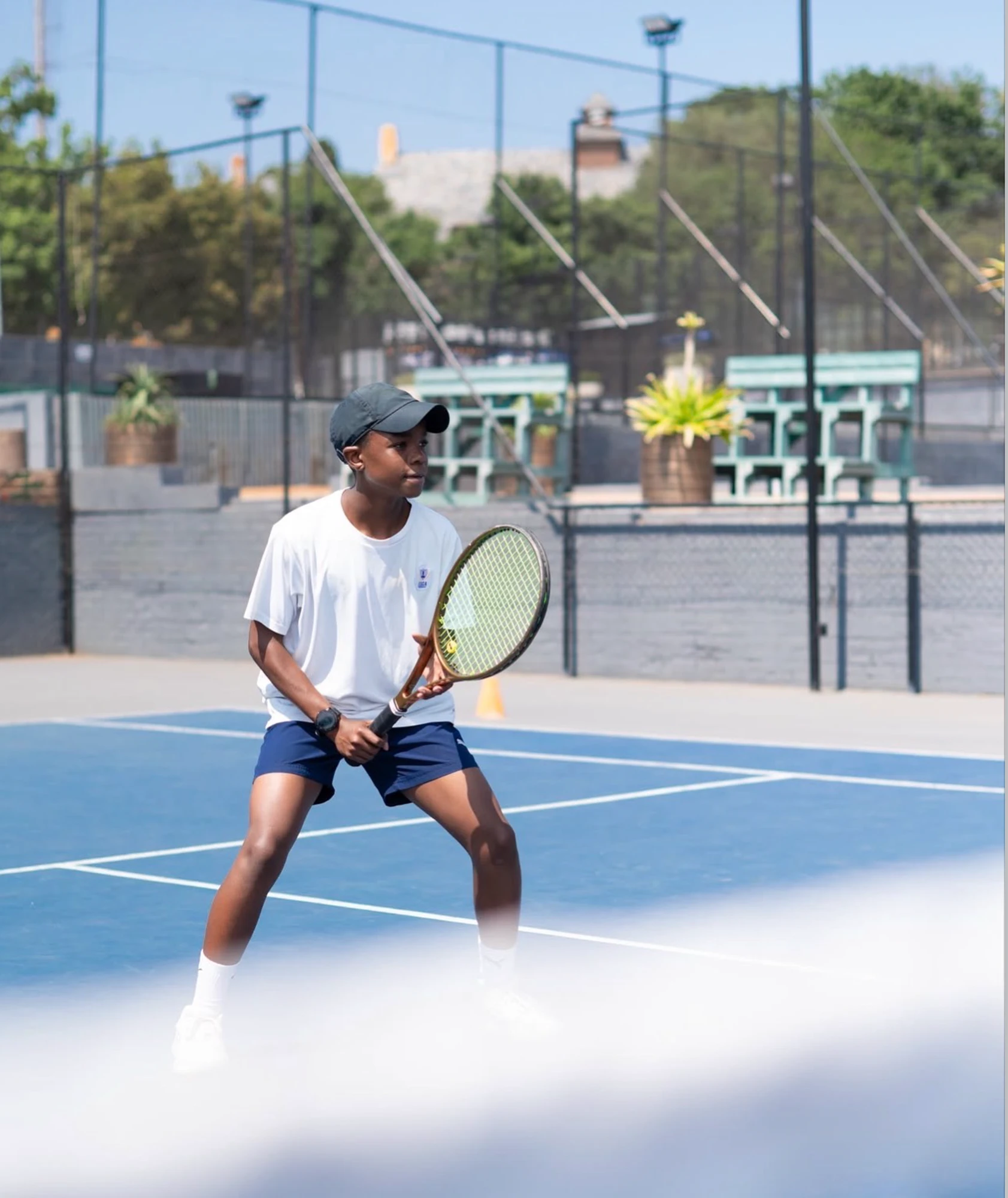 Esca Young Boy Playing Tennis Outdoors