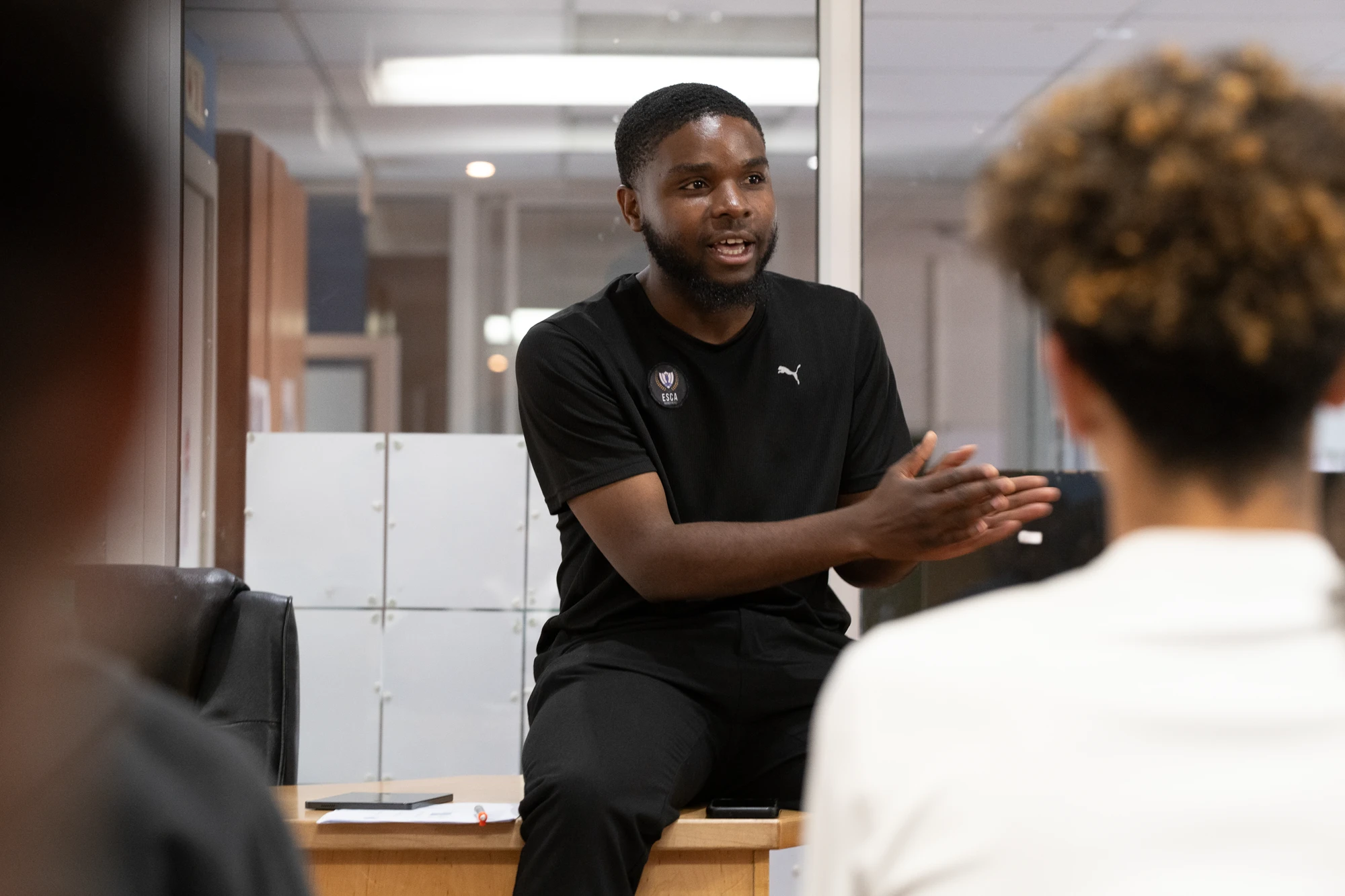 Esca Man Speaking To Group