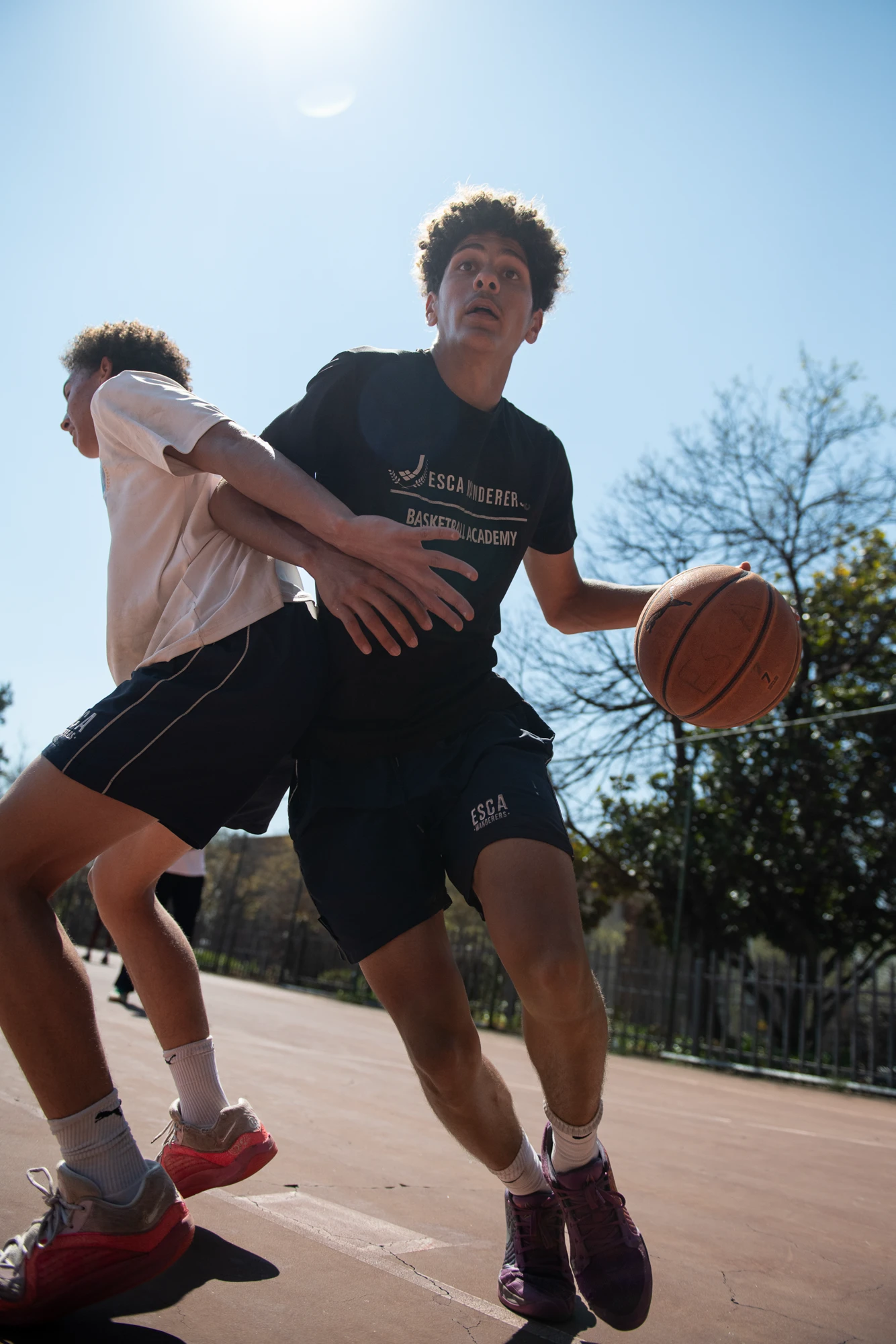 Esca Two Basketball Players Fighting