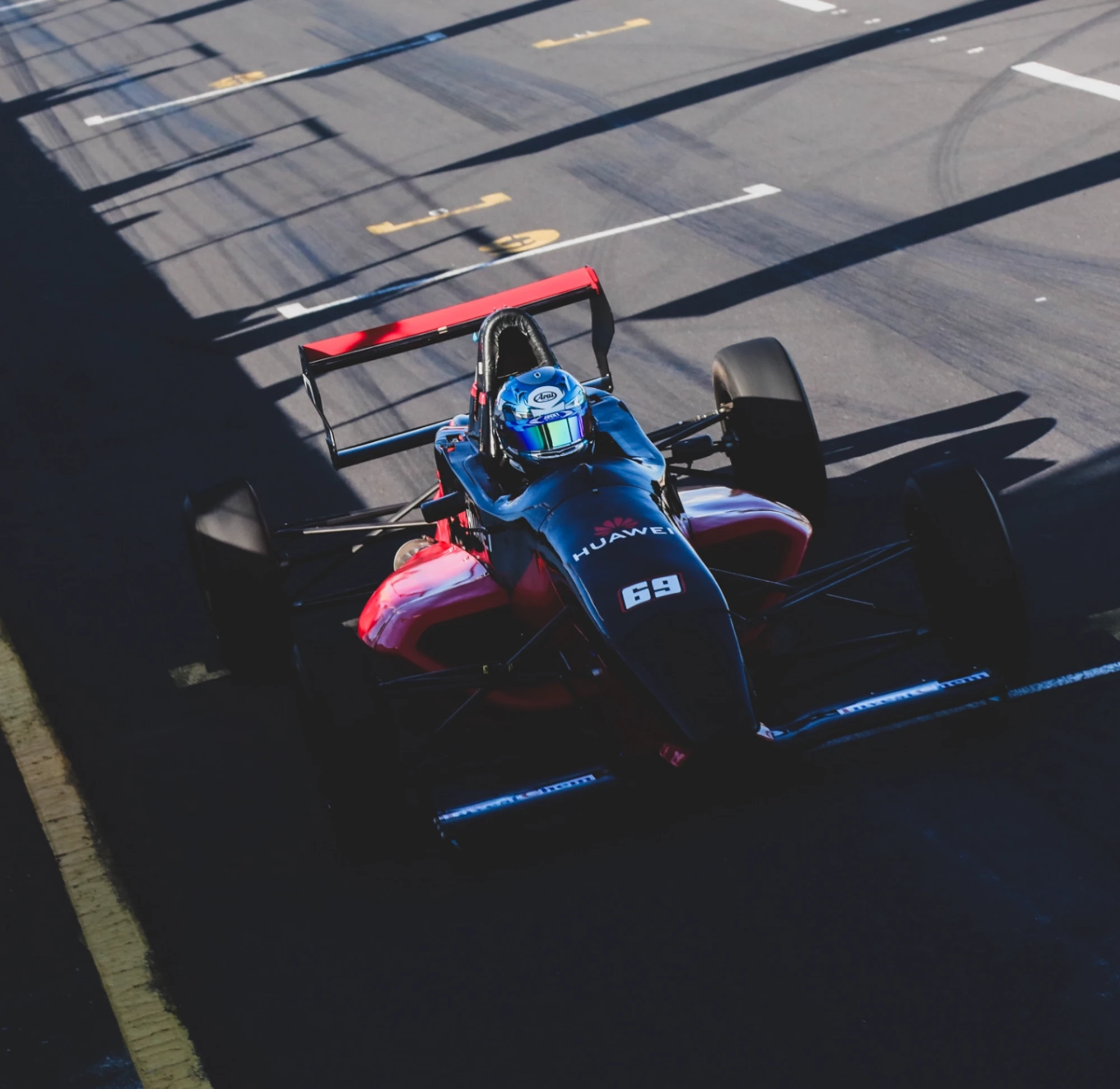 Esca Race Car On Track Driver In Helmet