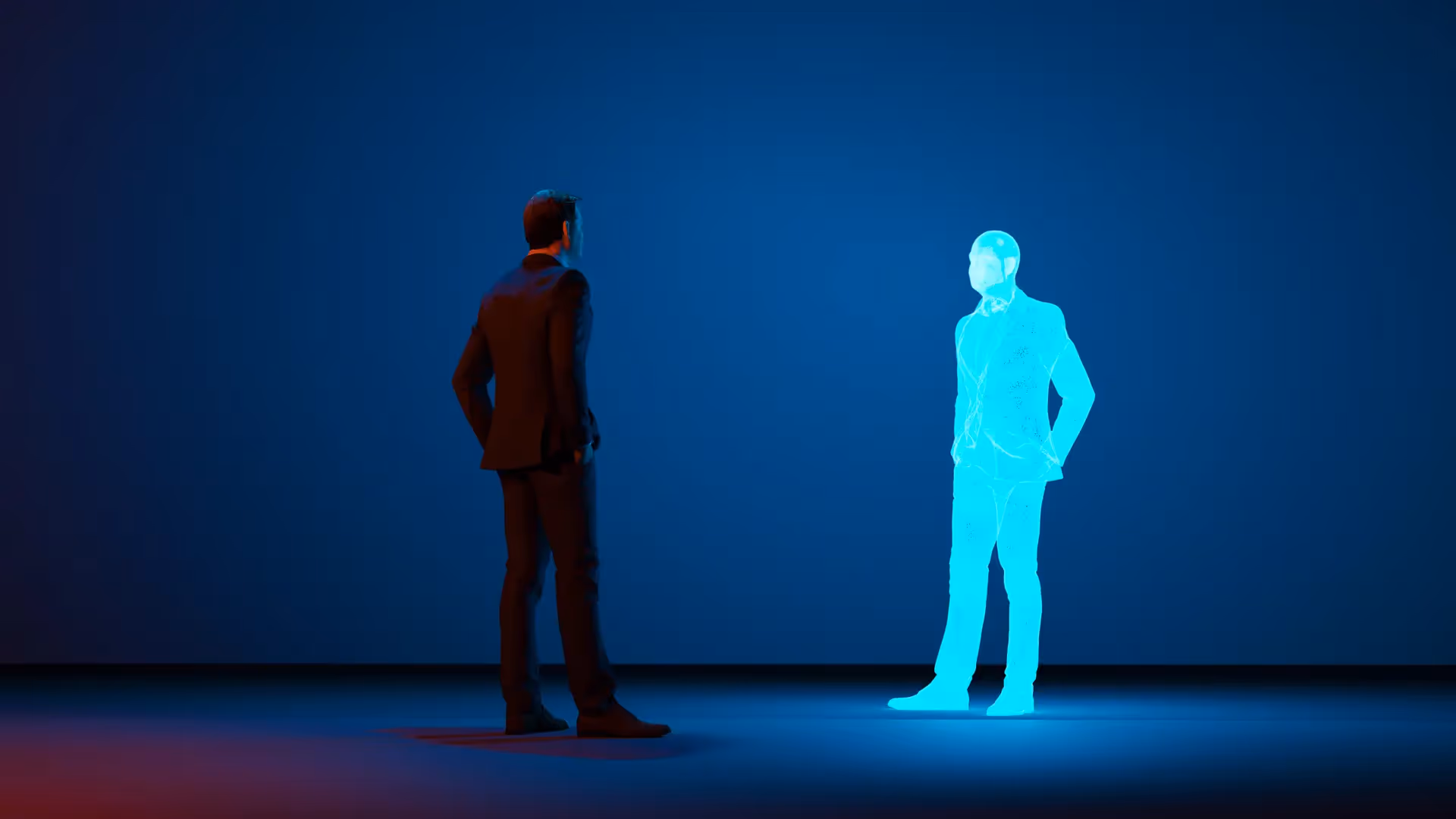Man in a dark suit standing and facing a glowing blue holographic figure of a man in a suit against a dark blue background.